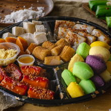 Load image into Gallery viewer, Indulge in a diverse selection of traditional Filipino delicacies with our Kakanin Platter. Featuring a variety of kakanin, this platter offers a taste of different flavors and textures. Perfect for sharing, celebrations and gift-giving ideas
