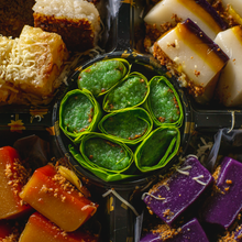 Load image into Gallery viewer, Indulge in a diverse selection of traditional Filipino delicacies with our Kakanin Platter. Featuring a variety of kakanin, this platter offers a taste of different flavors and textures. Perfect for sharing, celebrations and gift-giving ideas
