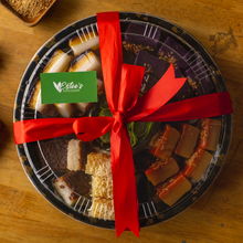 Load image into Gallery viewer, Indulge in a diverse selection of traditional Filipino delicacies with our Kakanin Platter. Featuring a variety of kakanin, this platter offers a taste of different flavors and textures. Perfect for sharing, celebrations and gift-giving ideas
