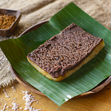 Load image into Gallery viewer, Rice Cake topped with sweet and creamy latik.
