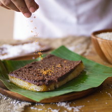 Load image into Gallery viewer, Rice Cake topped with sweet and creamy latik.
