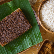 Load image into Gallery viewer, Rice Cake topped with sweet and creamy latik.
