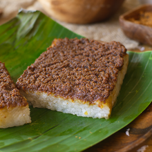 Load image into Gallery viewer, Rice Cake topped with sweet and creamy latik.
